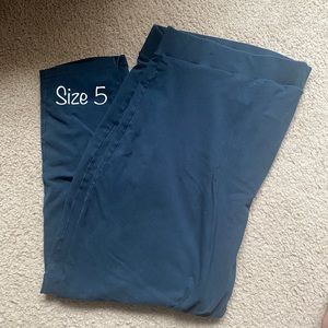 Teal and black leggings from Torrid. Size 5.